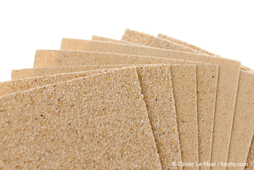 fan-arranged stack of sanding paper as an application example for aluminum oxide particles in sanding
